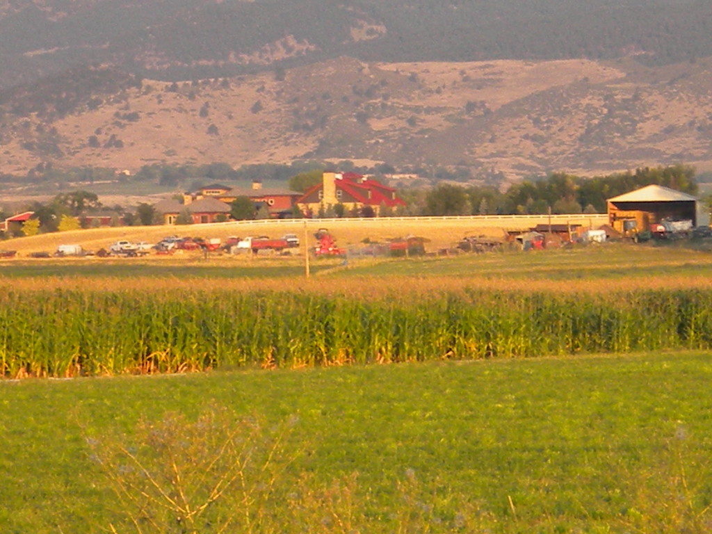 vehicles and foothills west of town