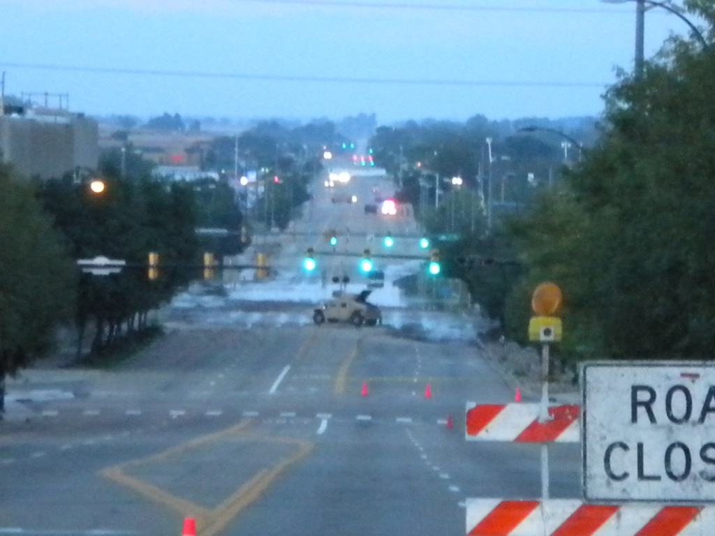 Highway 287 flooded and closed  -- looking south from 3rd and Main