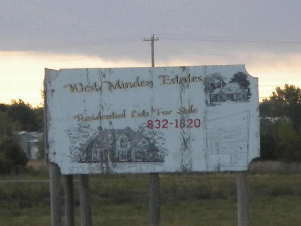 dilapidated Minden West Estates sign