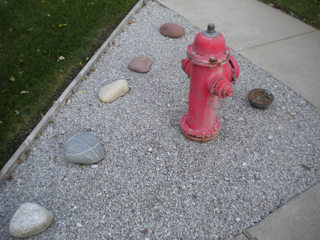 triangular curb rocks & hydrant