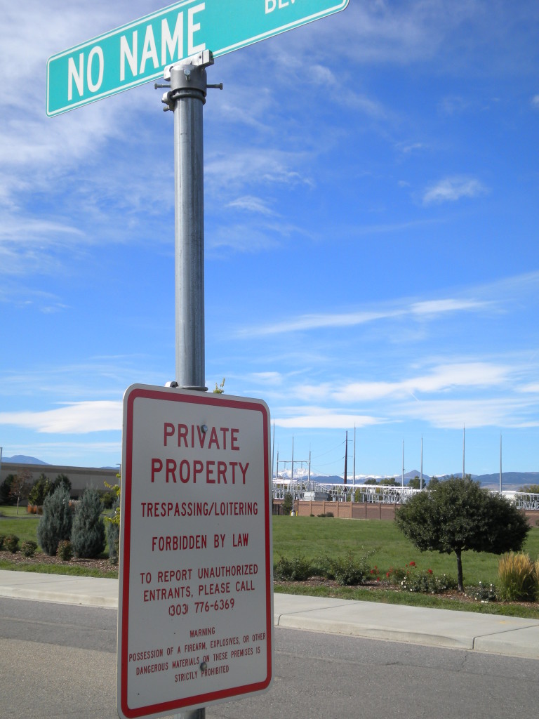 Private Property -- no tresspassing or loitering on NO NAME Blvd.