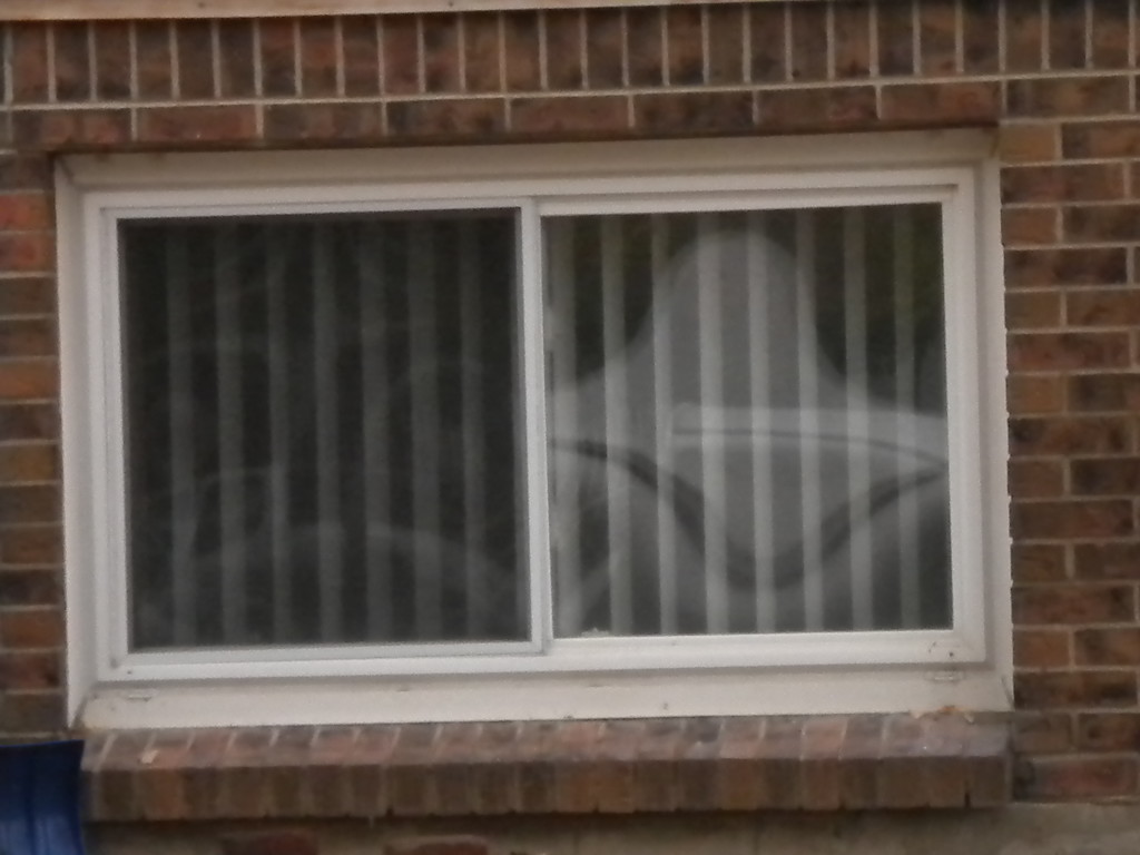 I don't think this is a Halloween decoration, but that right window looks pretty spooky